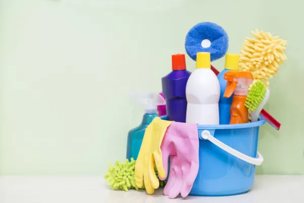 House cleaning supplies in a bucket.
